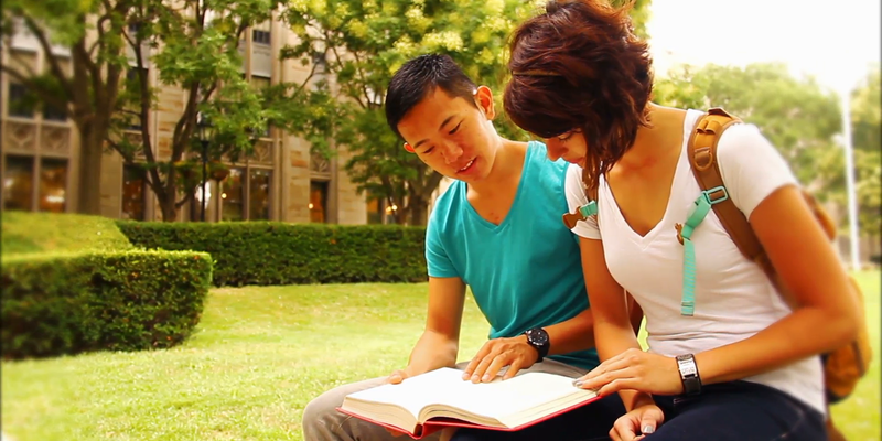 Medium college students on campus sit outside and study 71sa 3as  f0000